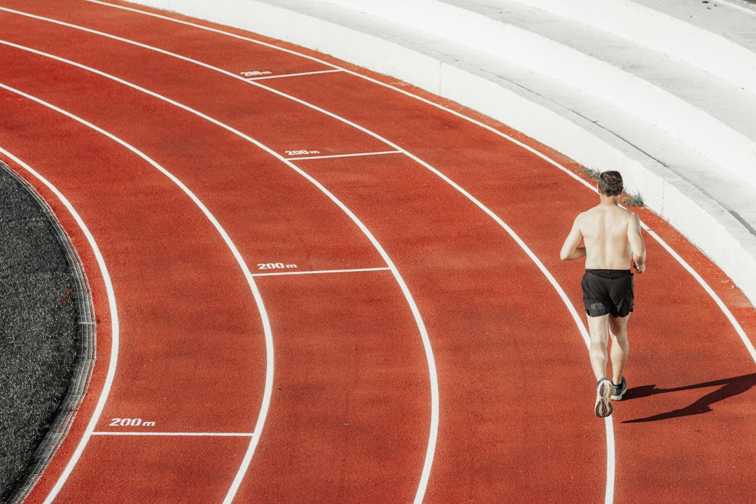Athlete training on a running track; illustrative image for Ghana sports development coverage