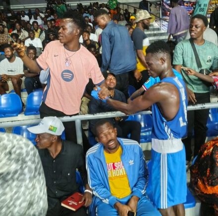 A boxer in blue gear at the 2026 IBA Africa Elite Boxing Championships, in a Graphic Online photograph accompanying coverage of Ghana's campaign; the athlete is not identified here as Ebenezer Ankrah.