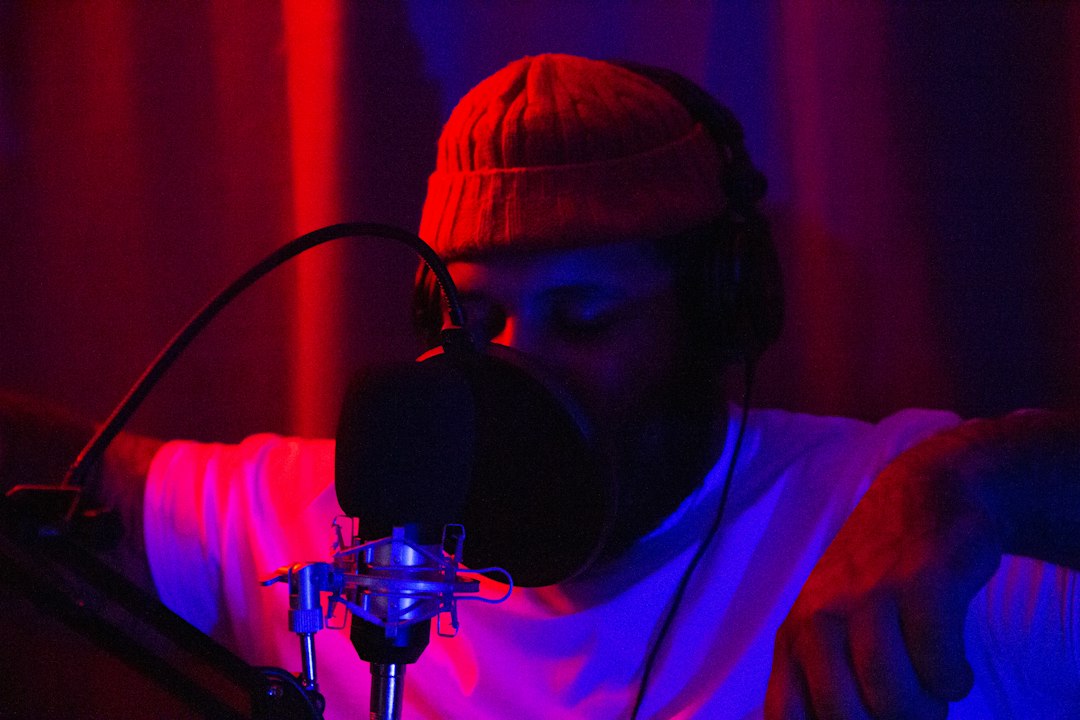 Musician recording vocals in a studio